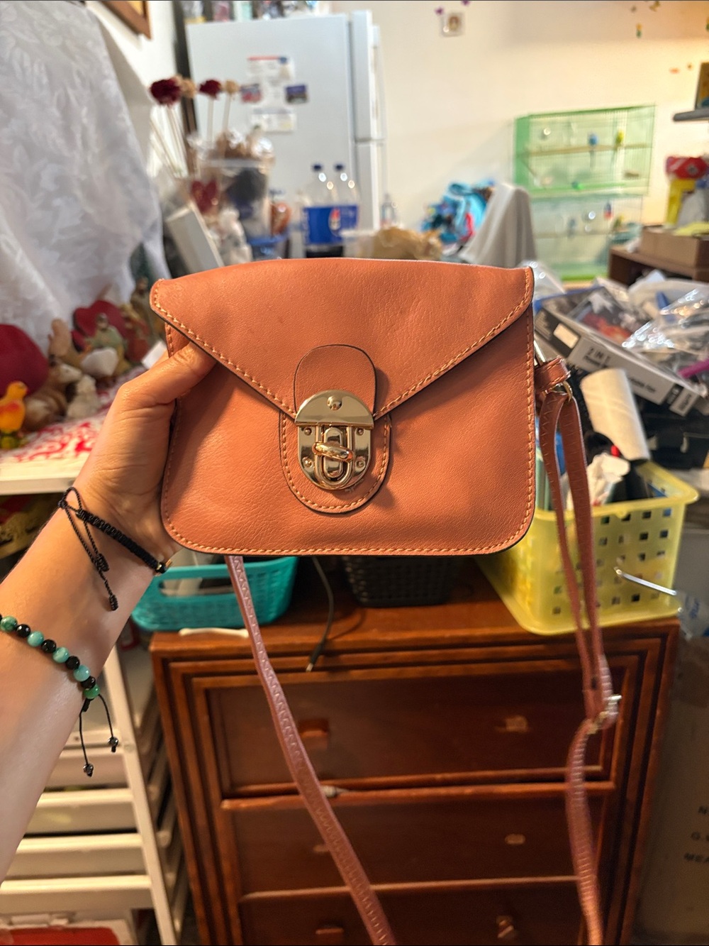 Stylish Peach Crossbody Bag with Gold Lock